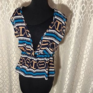 Papaya women’s top size M. Thinner outer material w pattern and black under